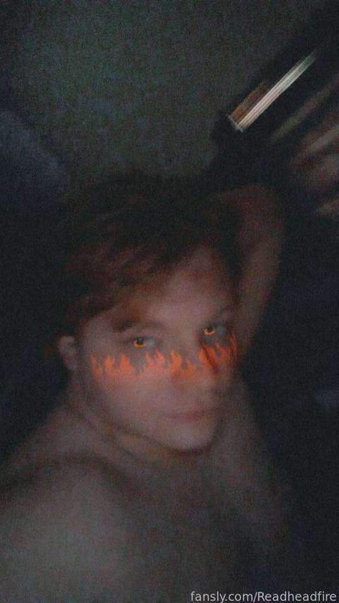 fansly firey red profile photo  